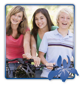 stock photo three friends riding their bikes